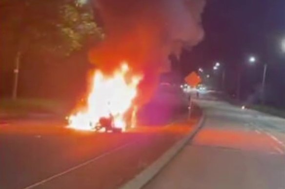 A man has escaped with burns and suspected fractures from a sedan torn in half after hitting a power pole at Villawood.