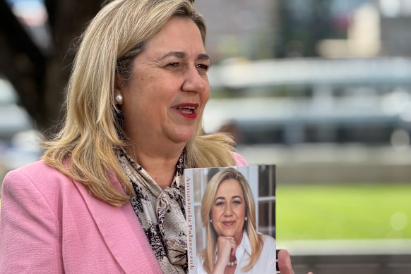 Former Queensland premier Annastacia Palaszczuk with her memoir, The Politics of Being Me, in Brisbane last week.