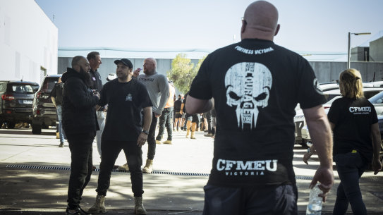 CFMEU delegates dispersing from an emergency meeting in Melbourne on Tuesday.