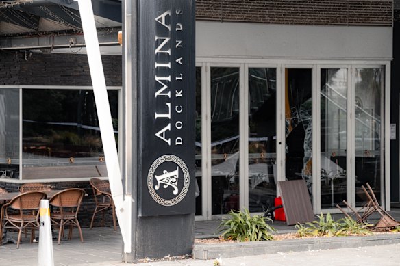 A jerry can and an upturned table outside Almina restaurant which was damaged last night in an arson attack. 