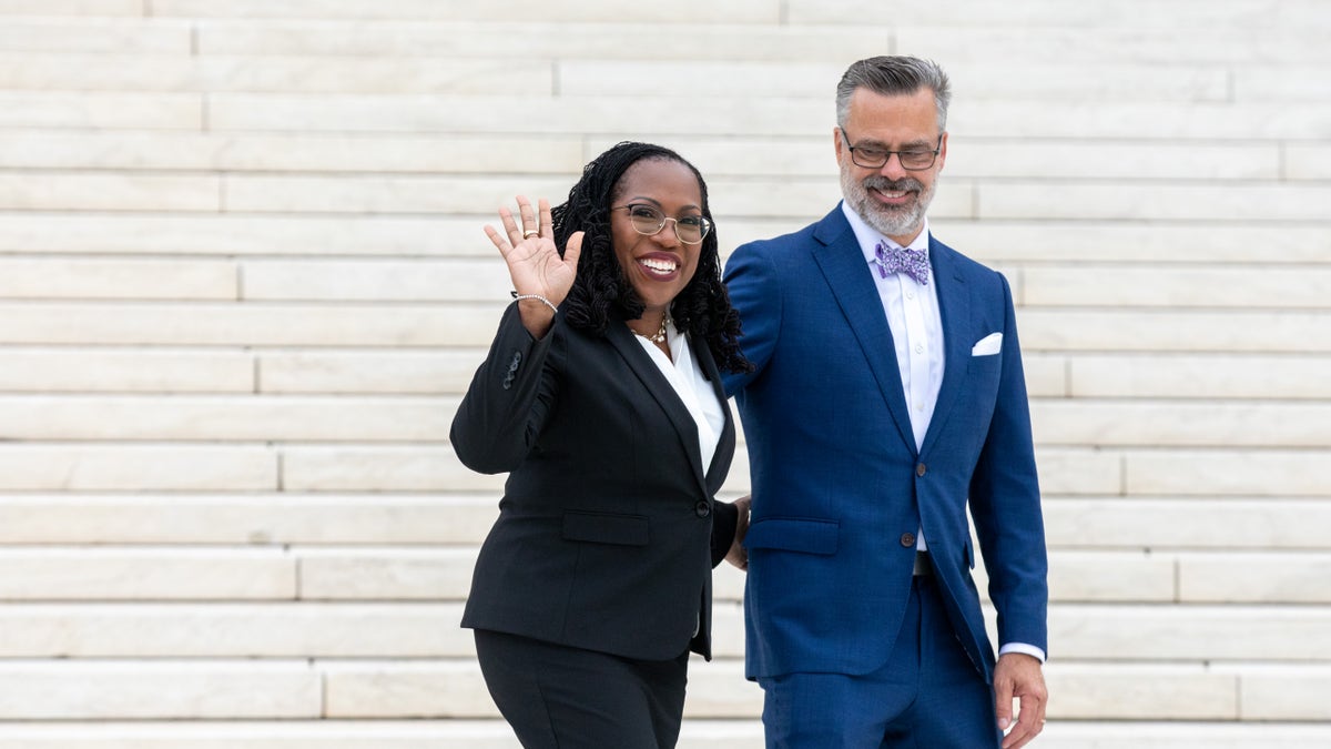Ketanji Brown Jackson, associate justice of the US Supreme Court, and husband Patrick Jackson on the front plaza of the Supreme Court building following an investiture ceremony in Washington, D.C.