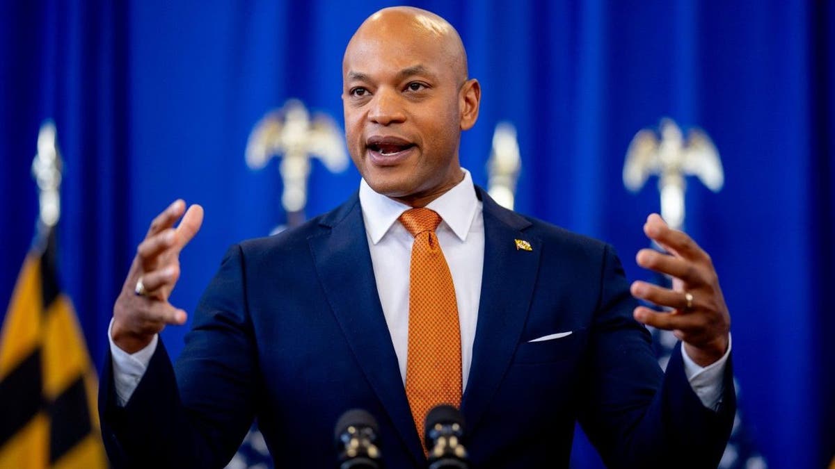 Maryland Gov. Wes Moore speaking at a campaign event with Angela Alsobrooks in Landover, Maryland