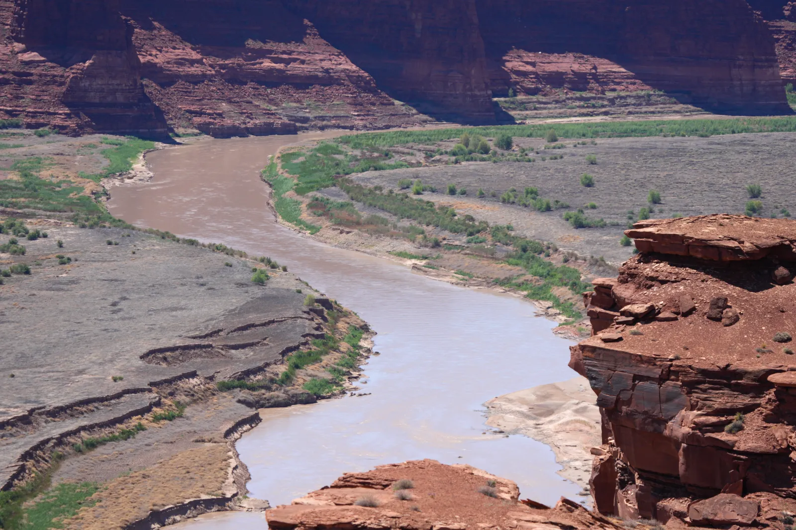 The Colorado River runs through the Hite area of Lake Powell, where the waters of the lake used to be, on April 23, 2026, in Lake Powell, Utah.