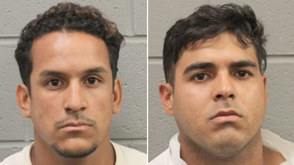 Franklin Jose Peña Ramos and Johan Jose Martinez-Rangel standing in a jail setting