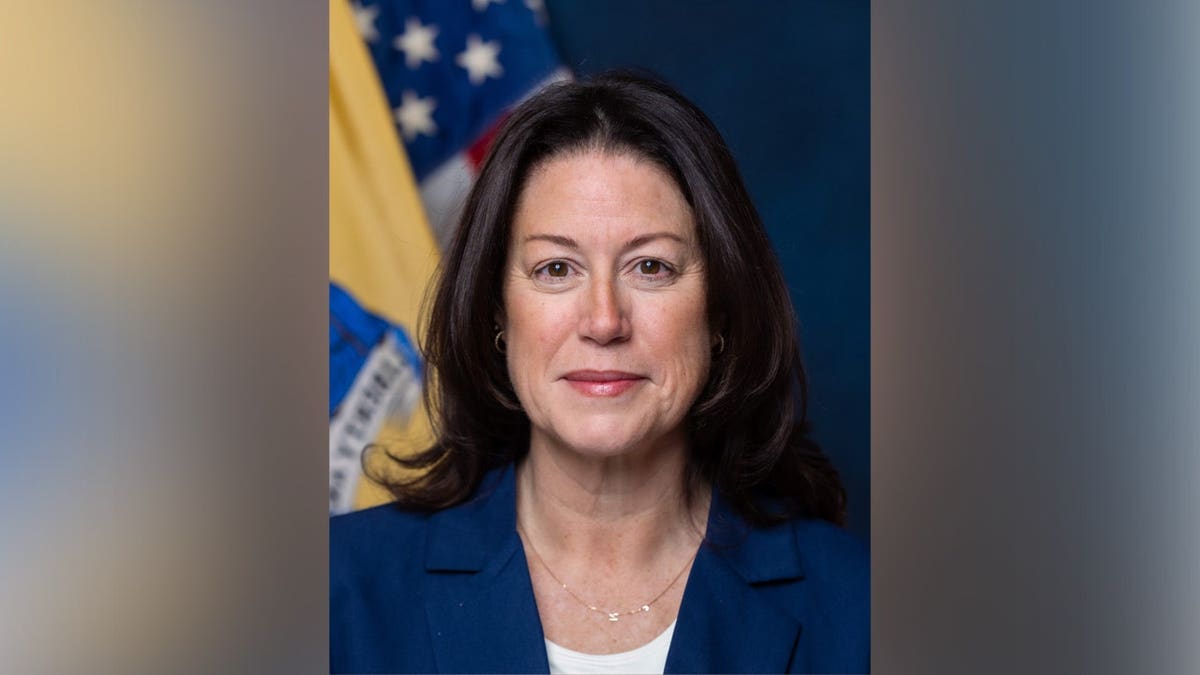 New Jersey Attorney General Jennifer Davenport poses for a head shot in front of the U.S. and New Jersey flags