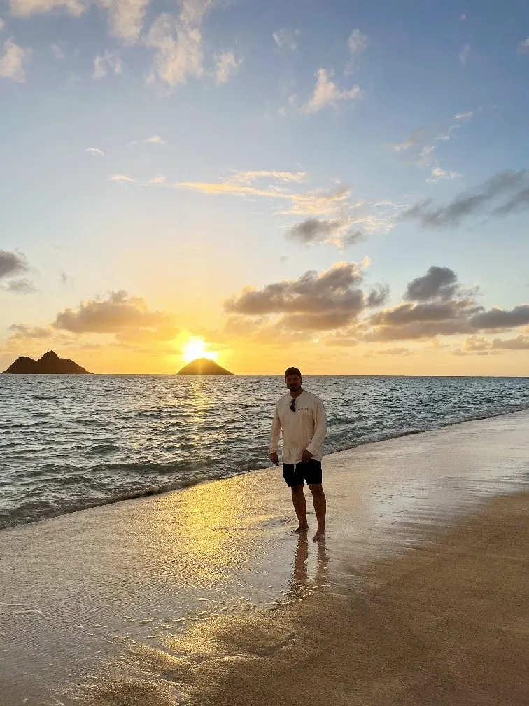 DePaul during sunrise on Hawaii's Lanikai Beach.