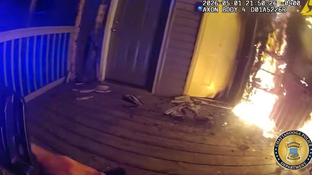 A house on fire on the front porch.