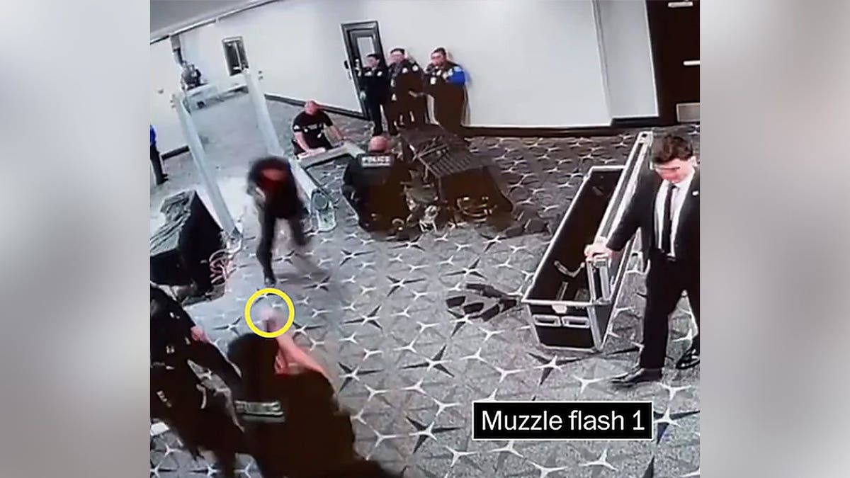 A Secret Service agent fires at Cole Allen.