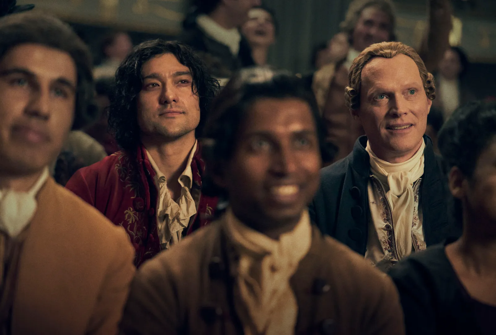 Will Sharpe (left0 as musical prodigy Wolfgang ‘Amadeus’ Mozart and Paul Bettany (right) as envious court composer Antonio Salieri in Starz's Amadeus. Photo courtesy of Starz.
