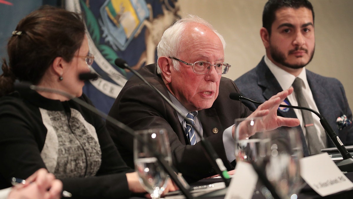 Sen. Bernie Sanders speaking with Dr. Abdul El-Sayed and Dr. Alison Galvani at a roundtable in Detroit
