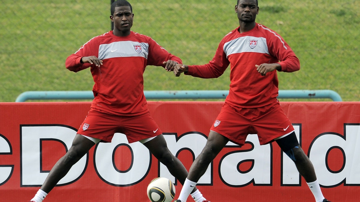 Striker Edson Buddle (left) and Maurice Edu train during the buildup to the 2010 World Cup in South Africa. (Getty Images)