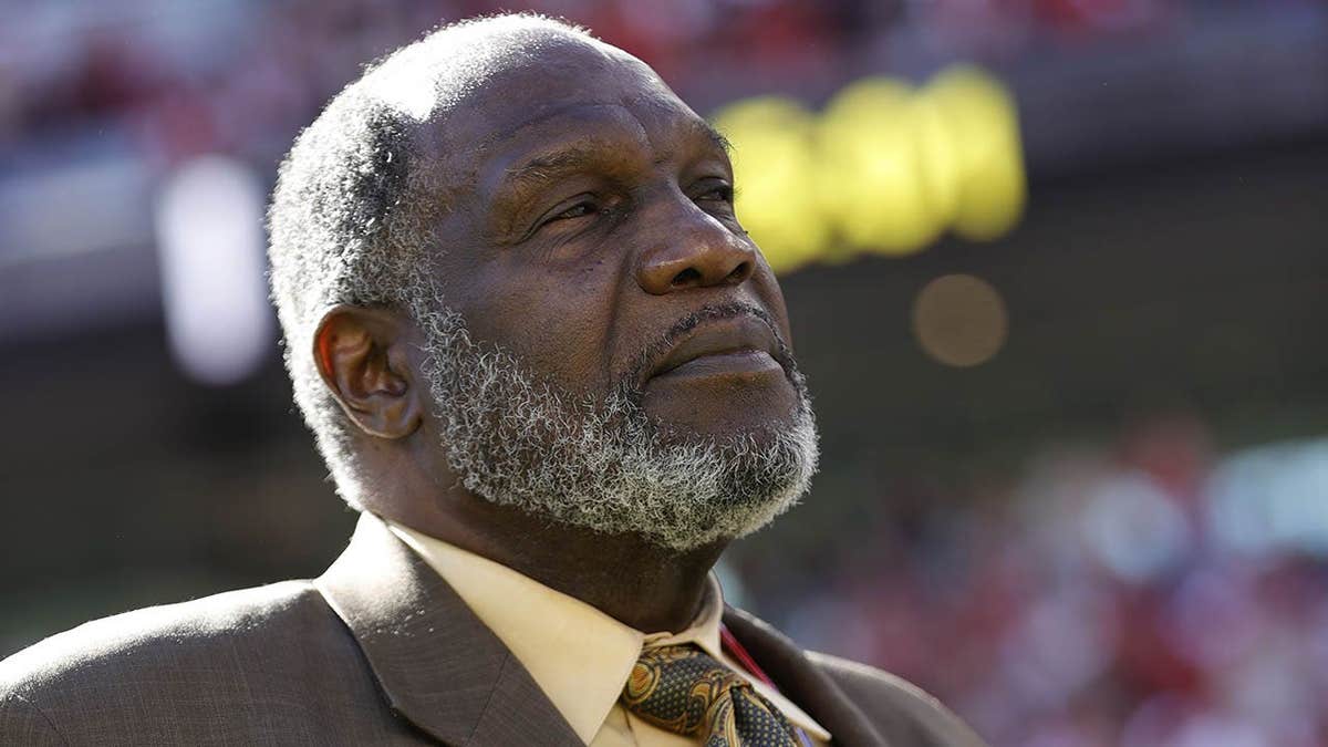 Alumni Charle Young of the San Francisco 49ers standing on the field at Levi's Stadium