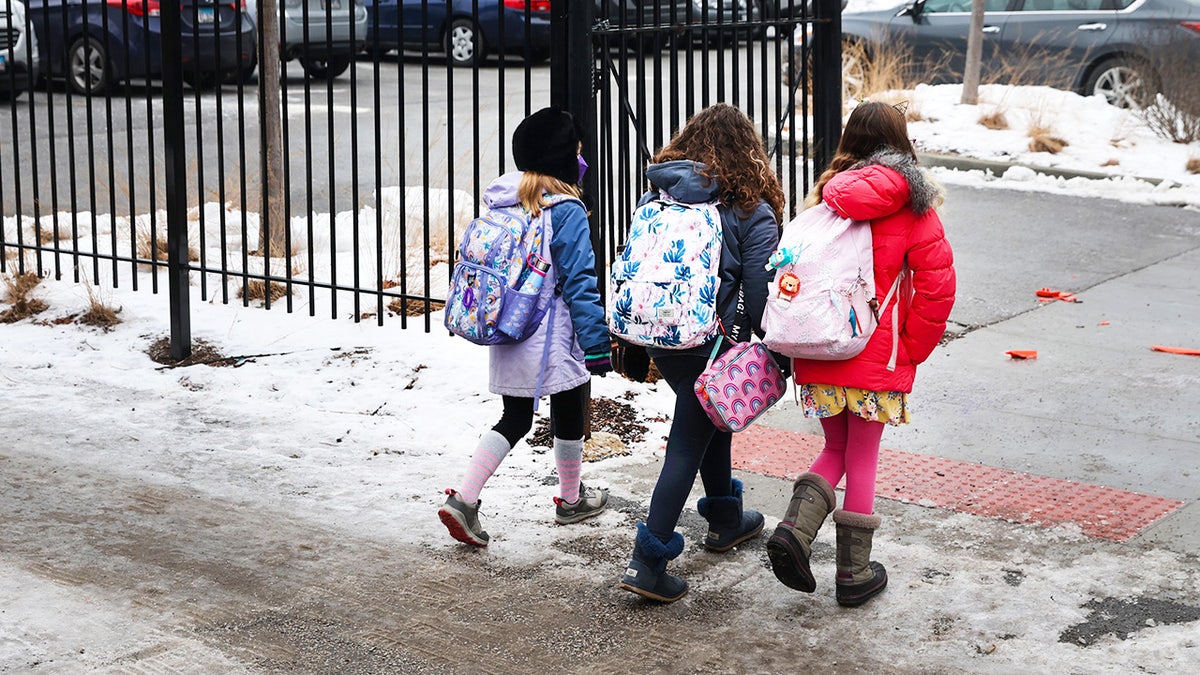 Students walking to A. N. Pritzker elementary school in Chicago