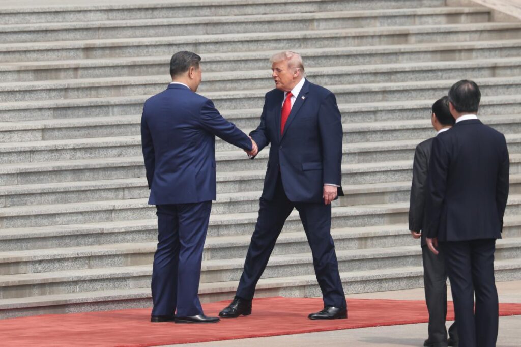 Trump greets Xi in Beijing to kick off historic China summit