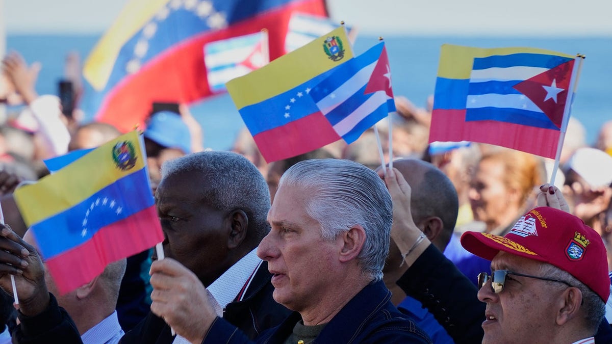 Cuban President Miguel Diaz-Canel greeting supporters at a rally in Havana