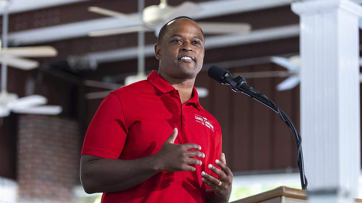 Daniel Cameron delivering a speech at the Fancy Farm Picnic in Kentucky