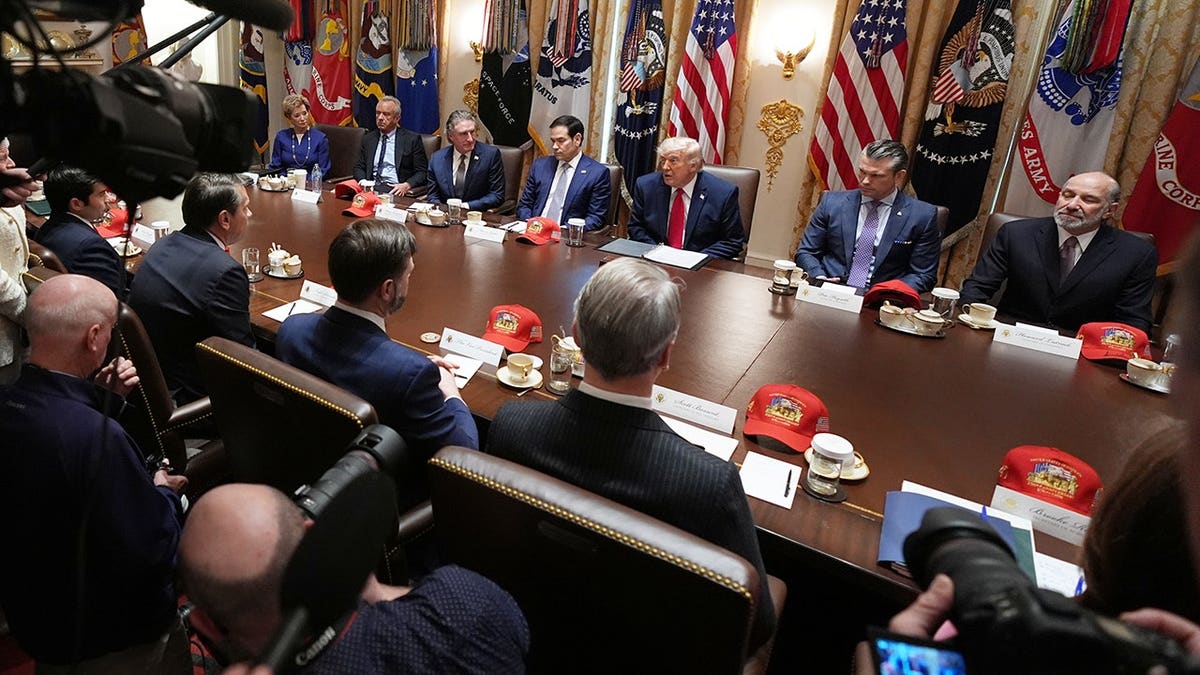 President Donald Trump attending a Cabinet meeting in the White House Cabinet Room