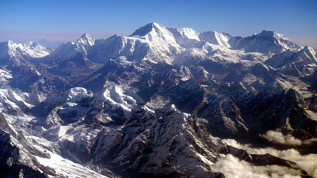 Mount Everest towering over the Himalayan range in Nepal
