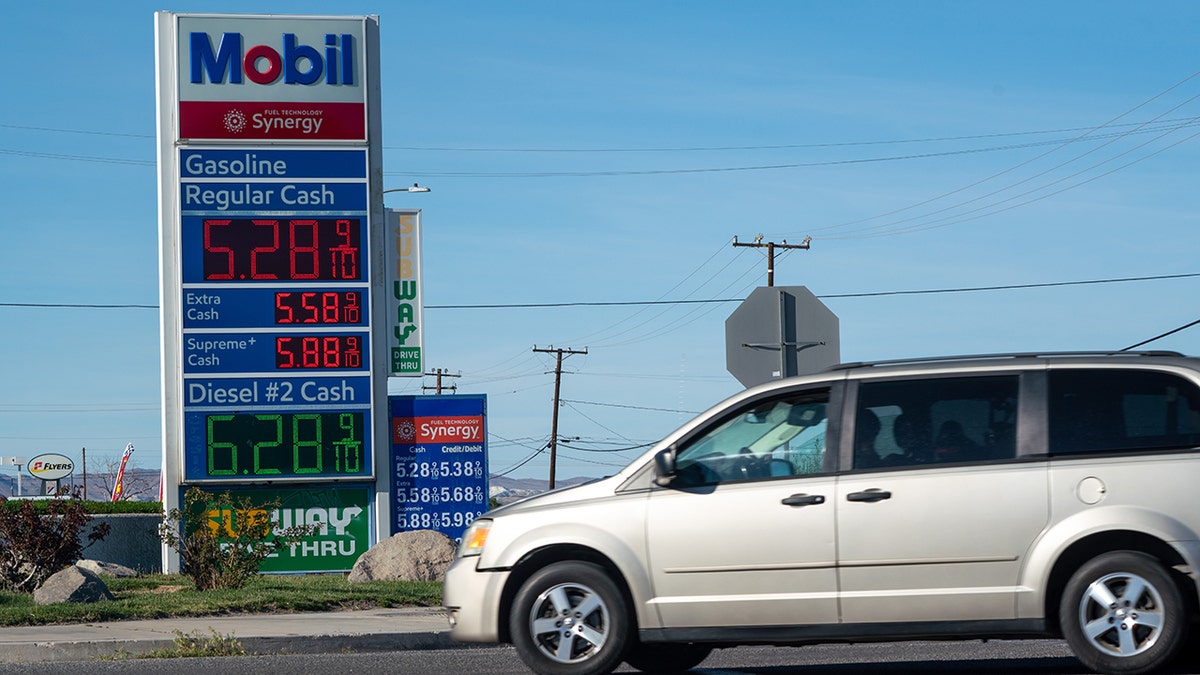 A Chevron gas station price sign showing unleaded gasoline and diesel fuel prices in Victorville, California