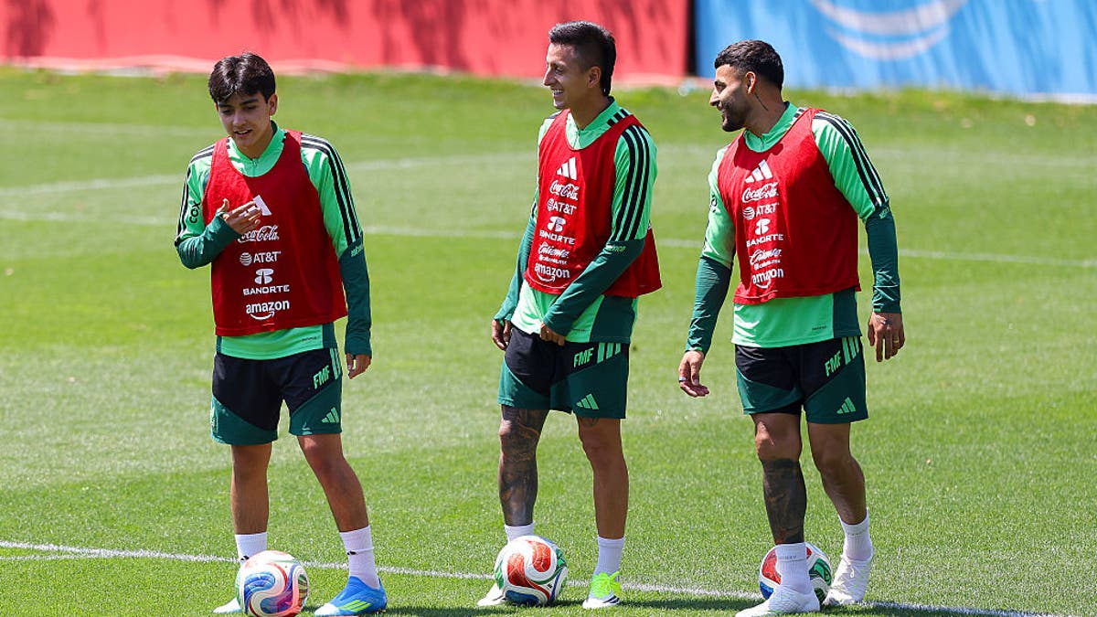 MEXICO CITY, MEXICO - MAY 20: Roberto Alvarado and Alexis Vega of Mexico laugh during a training session at CAR on May 20, 2026 in Mexico City, Mexico. (Photo by Agustin Cuevas/Getty Images)
