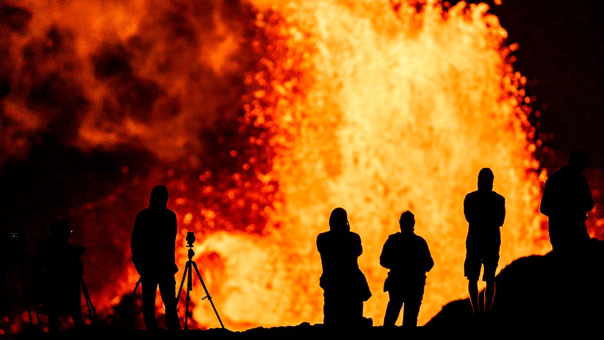 People watching Kilauea volcano erupt in Hawaii