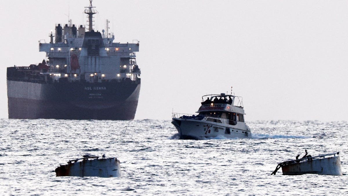 Israeli forces are seen near a vessel associated with the Global Sumud flotilla off the coast near Ashdod, Israel.