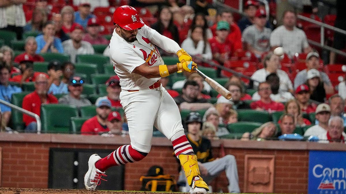 St. Louis Cardinals' Ivan Herrera hitting a home run during a baseball game.