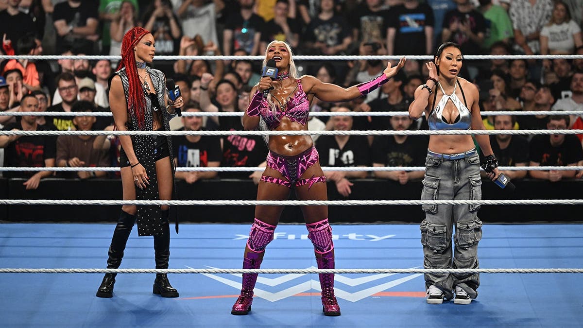 Jade Cargill addressing WWE Universe with B-Fab and Michin at Olimpic Arena