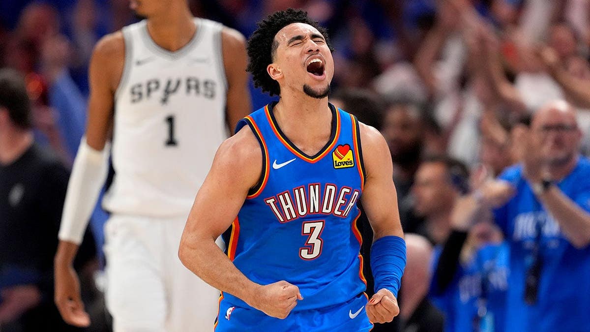 Oklahoma City Thunder guard Jared McCain celebrates after making a 3-pointer in a basketball game