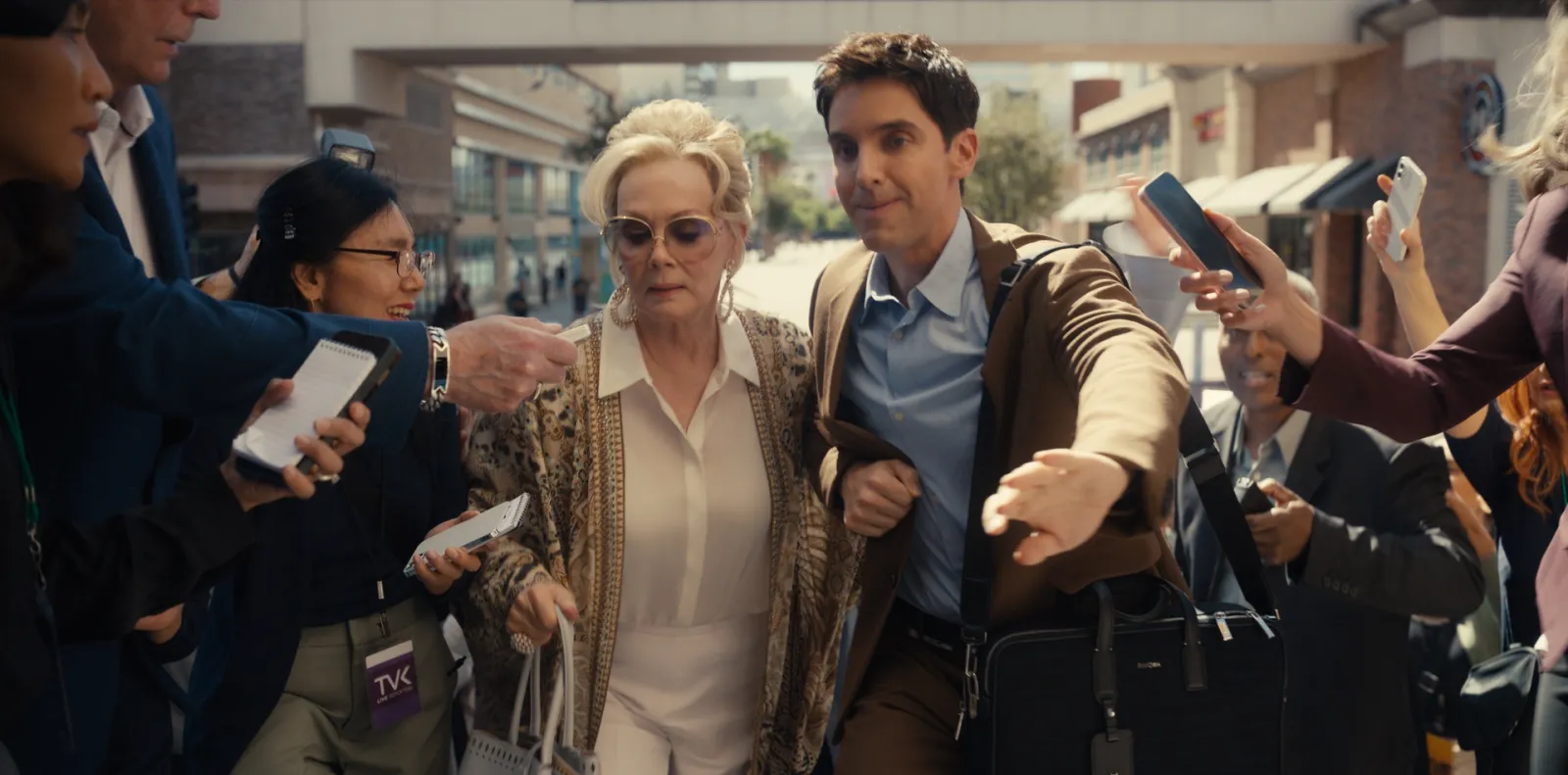 Jean Smart (L) and Paul W. Downs (R) in Hacks. Photograph by Courtesy of HBO Max.