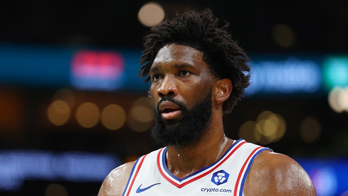 Joel Embiid of the Philadelphia 76ers looking on during a basketball game at TD Garden