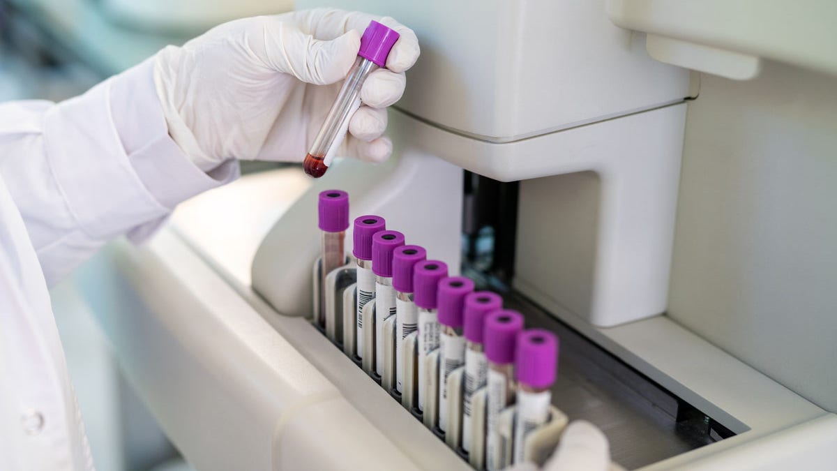 Lab technician conducting tests in a laboratory setting