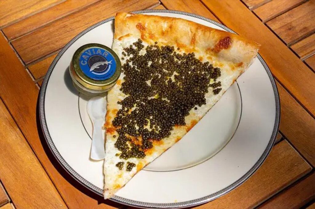 Philadelphia pizza shop sells  slices topped with caviar, served on gold plate with keepsake spoon