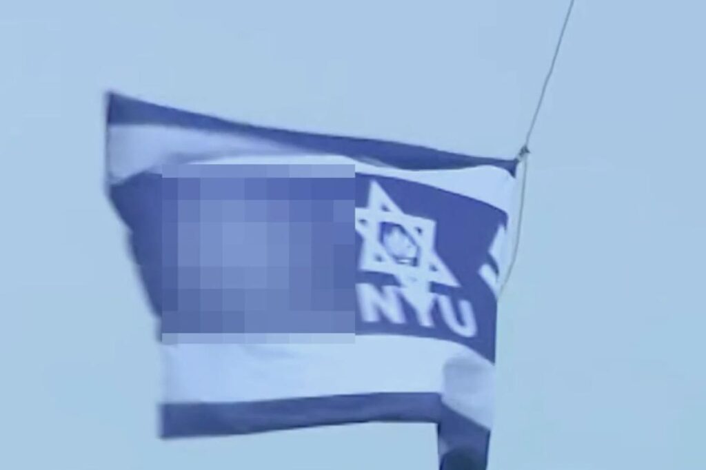 Swastika flag raised above NYU building named after billionaire Jewish causes donor during graduation week
