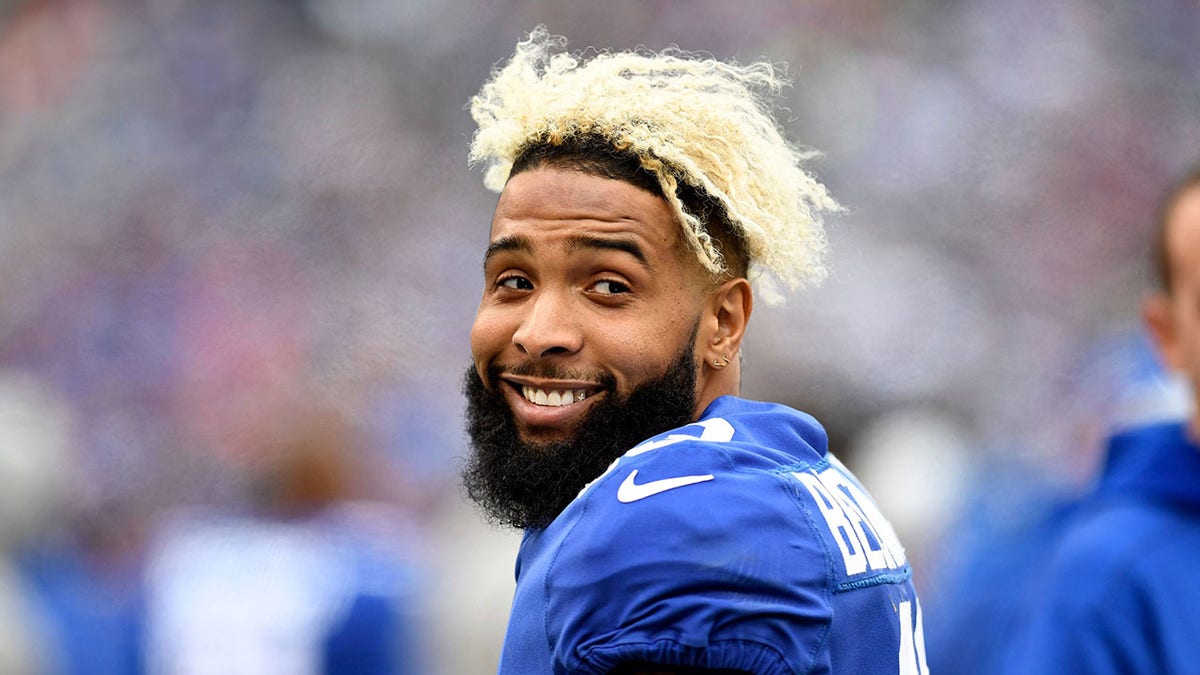 Odell Beckham Jr. standing in a New York Giants uniform