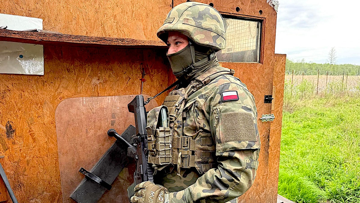Polish soldier guarding the border with Belarus