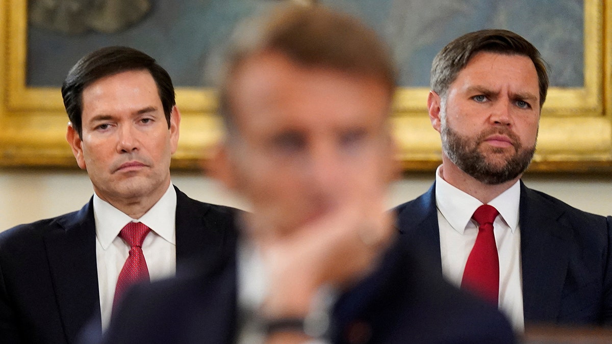 Secretary of State Marco Rubio and Vice President JD Vance looking on during a meeting at the White House