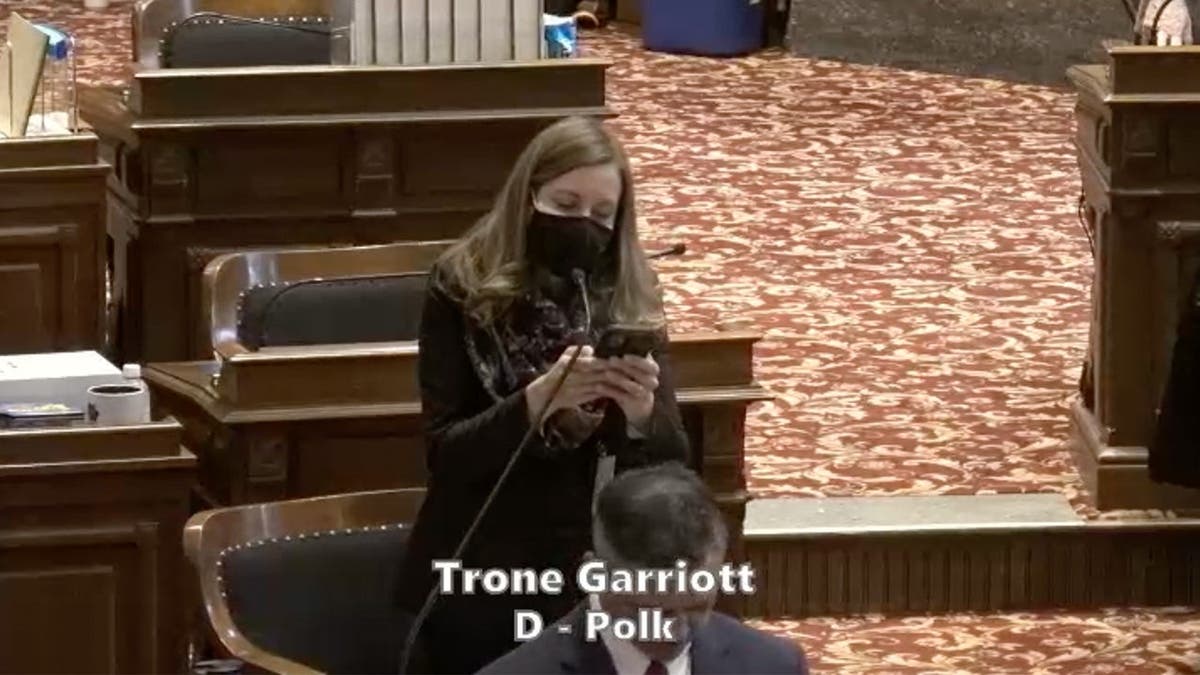 Sarah Trone Garriott reads an Islamic prayer on the Iowa Senate chamber floor