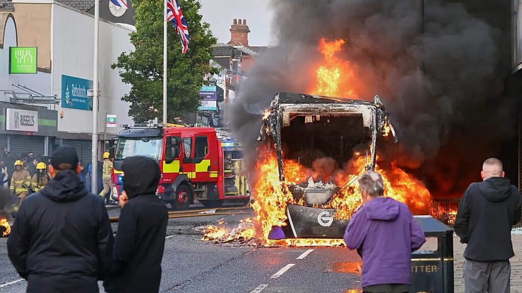 Vehicles set ablaze as protests erupt in Belfast following stabbing