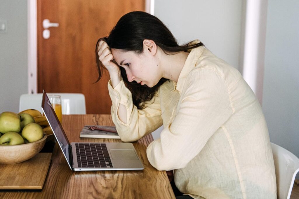 Remote workers more likely to get laid off than replaced by AI — and also face more mental distress, data shows
