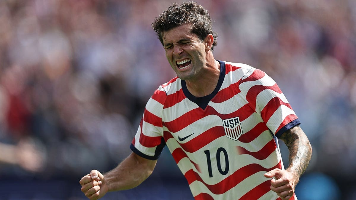 Christian Pulisic celebrating after scoring a goal at Bank of America Stadium in Charlotte