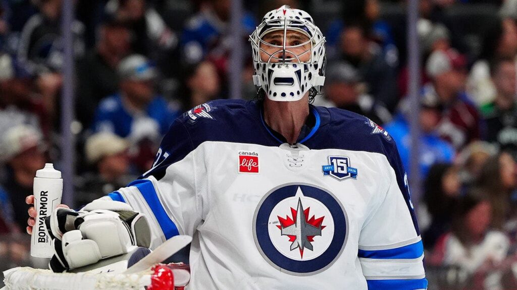 Winnipeg Jets general manager says team is ‘listening’ to trade offers for Olympic hero Connor Hellebuyck