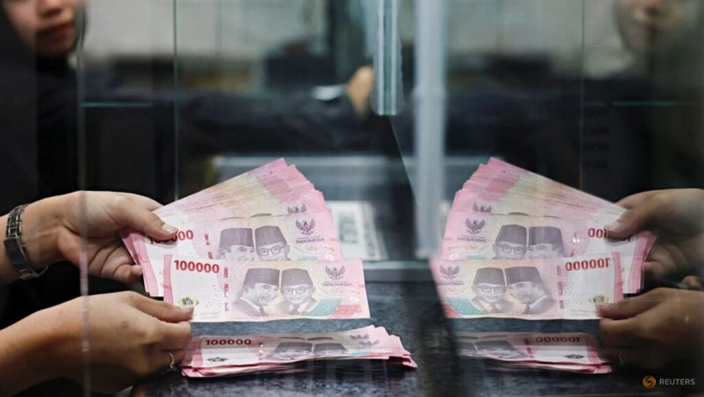 Indonesia raises rates in surprise move to prop up sinking rupiah Indonesia raises rates in surprise move to prop up sinking rupiah