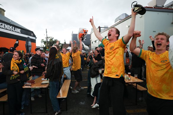 Socceroos fans watch the FIFA World Cup triumph over Turkey at the Sackville Hotel in Rozelle on June 14.