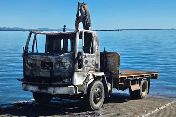 A torched truck with a crane found at a north Queensland boat ramp near where 40 kilograms of cocaine was allegedly located in the water in May 2026.