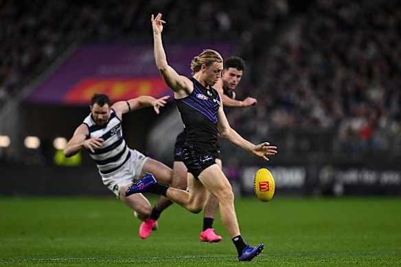 Hayden Young gets a kick away.