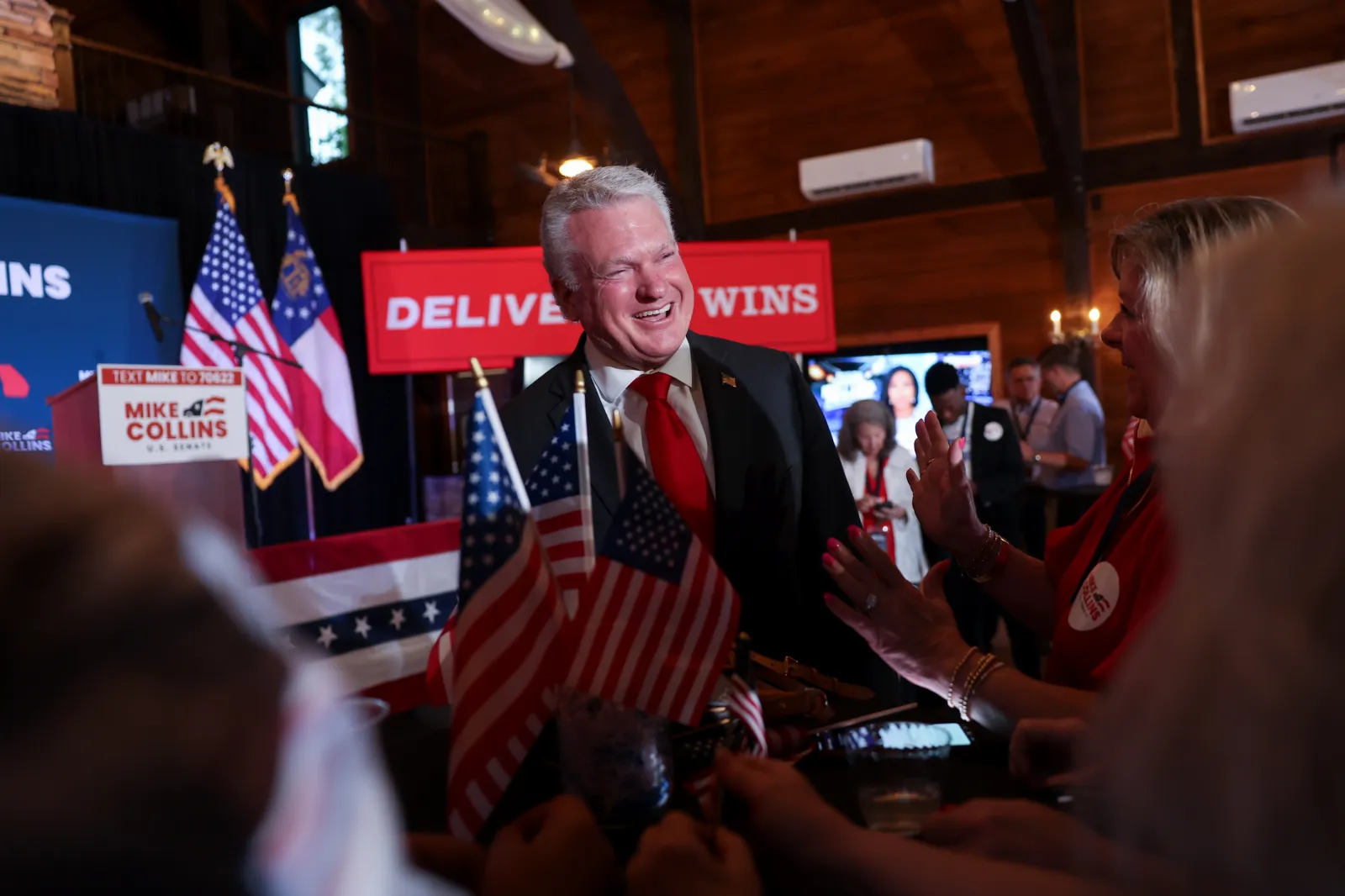 U.S. Representative Mike Collins greets supporters as he arrives at his primary election watch party in Jackson, Georgia, on May 19. (Arvin Temkar/Atlanta Journal-Constitution via AP)