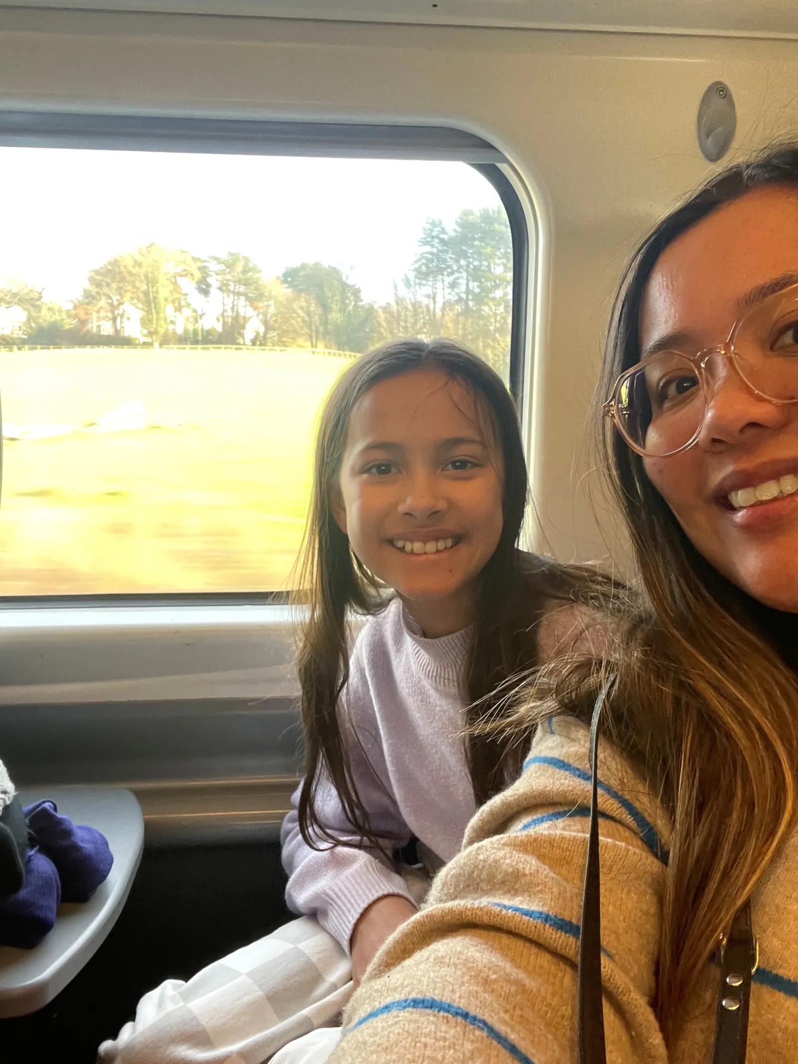 Barnes and her daughter on a train traveling between London and Manchester.