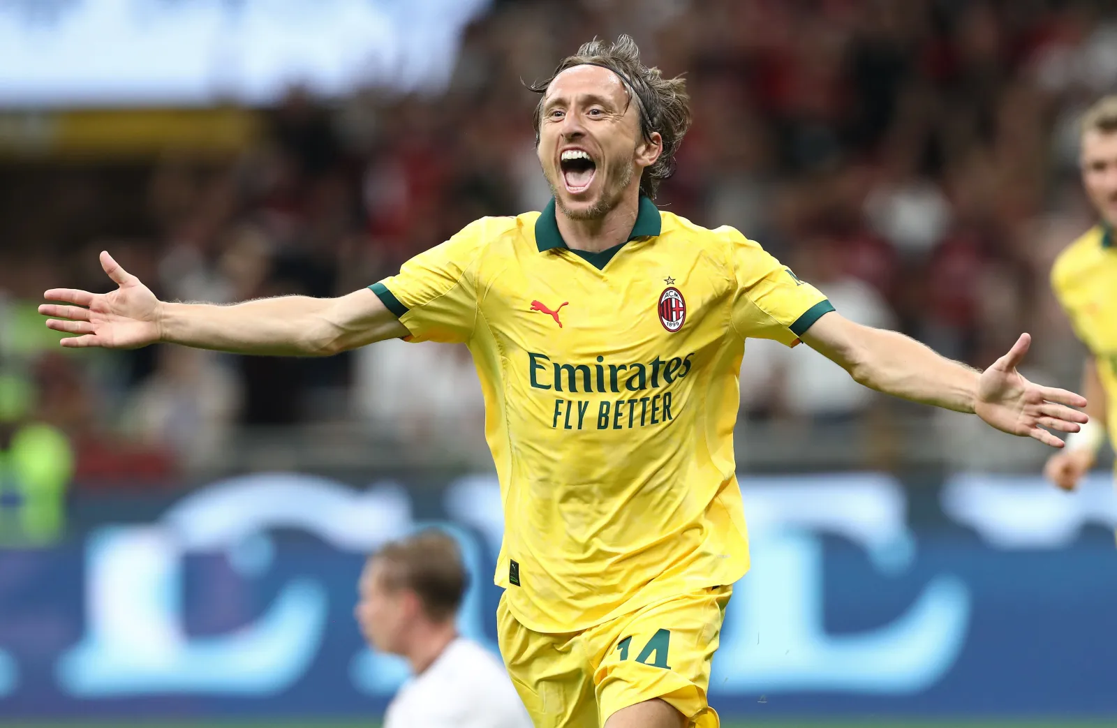 MILAN, ITALY - SEPTEMBER 14: Luka Modric of AC Milan  celebrates after scoring their team's first goalduring the Serie A match between AC Milan and Bologna FC 1909 at Giuseppe Meazza Stadium on September 14, 2025 in Milan, Italy. (Photo by Marco Luzzani/Getty Images)