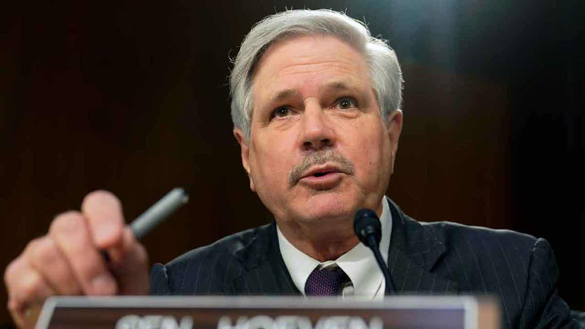 Sen. John Hoeven speaking at a podium on Capitol Hill in Washington